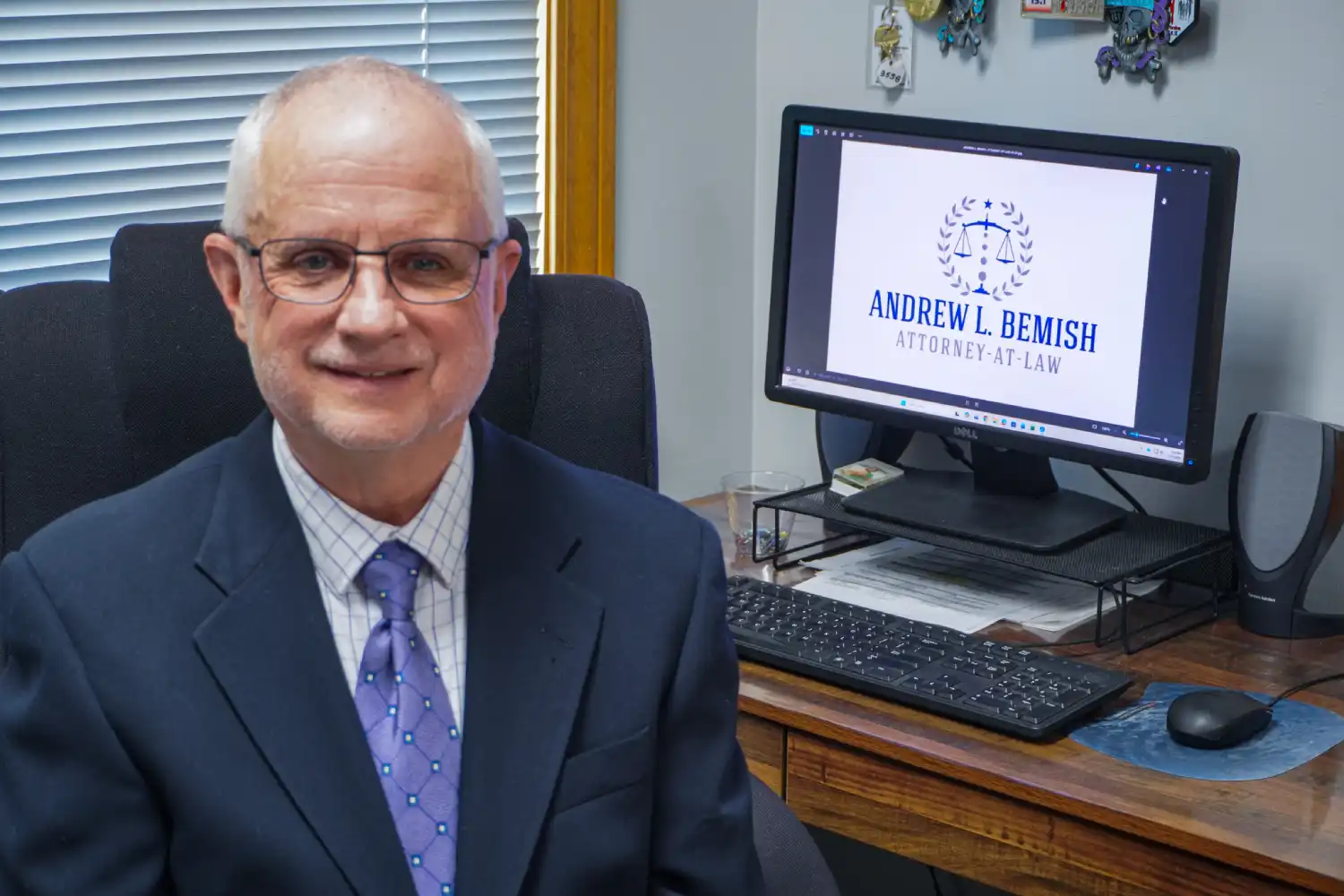 Andrew at desk