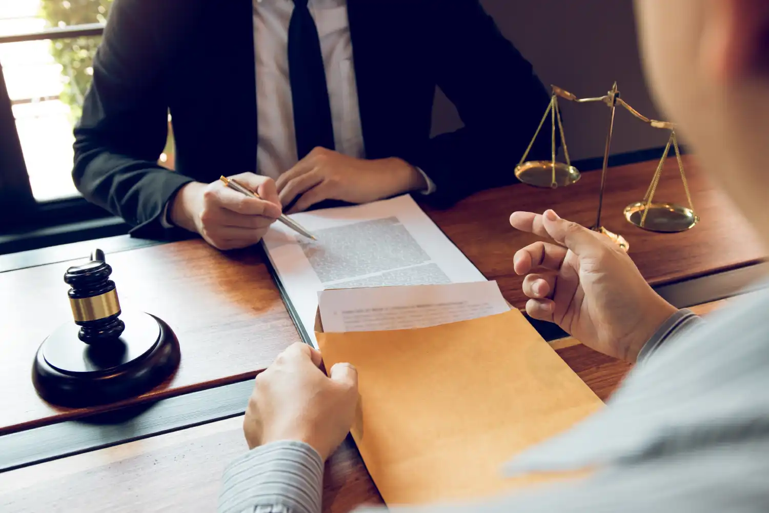 Legal consultation with gavel and balance scale